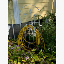 Iron Hose Wheel with 3 Finials & Stakes into the Ground