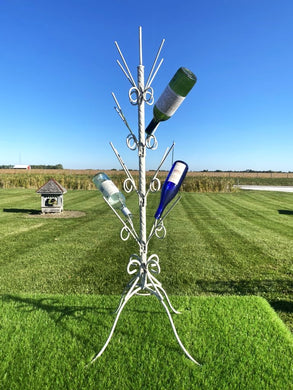 Wrought Iron Twisted Bottle Tree with a four-legged stand