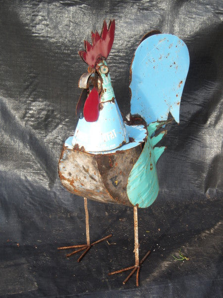 ROOSTER OUT OF RE-USED MATERIAL